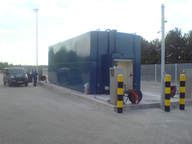 Fueltek FT4000AP with a 130,000 litre fuel storage tank in the background