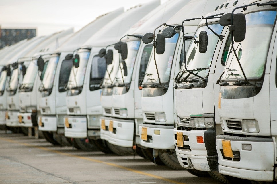 A fleet lined up in a business car park