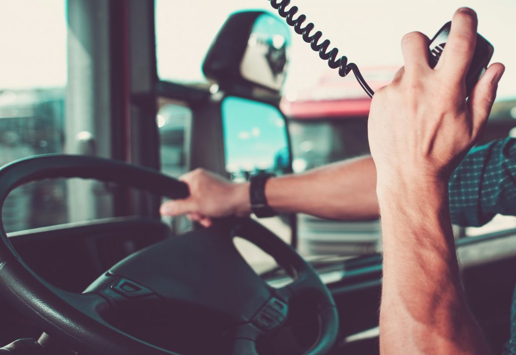 Truck Driving and Radio Chat with Other Drivers in Convoy.