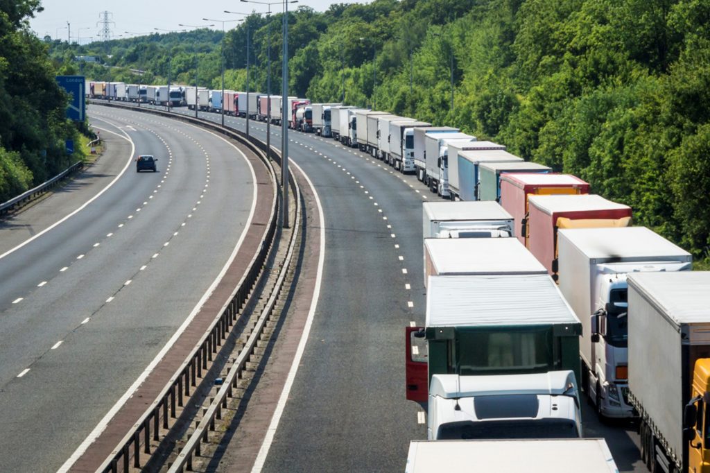 lots of lorries in traffic 