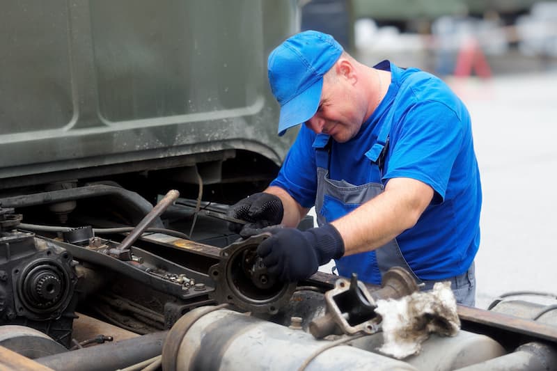 driver fixing truck